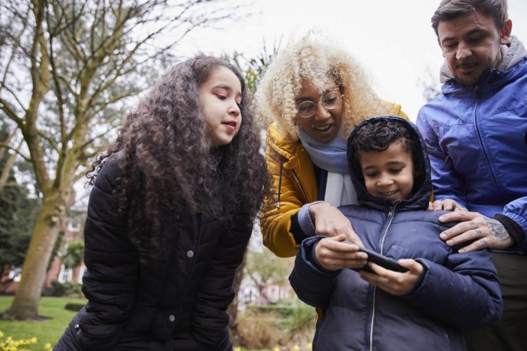 Family looking at a mobile